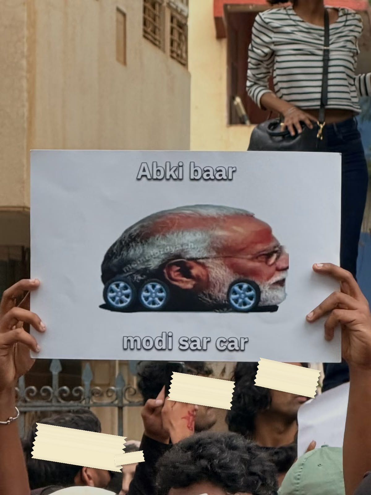 Archive photograph of a placard held at a public gathering