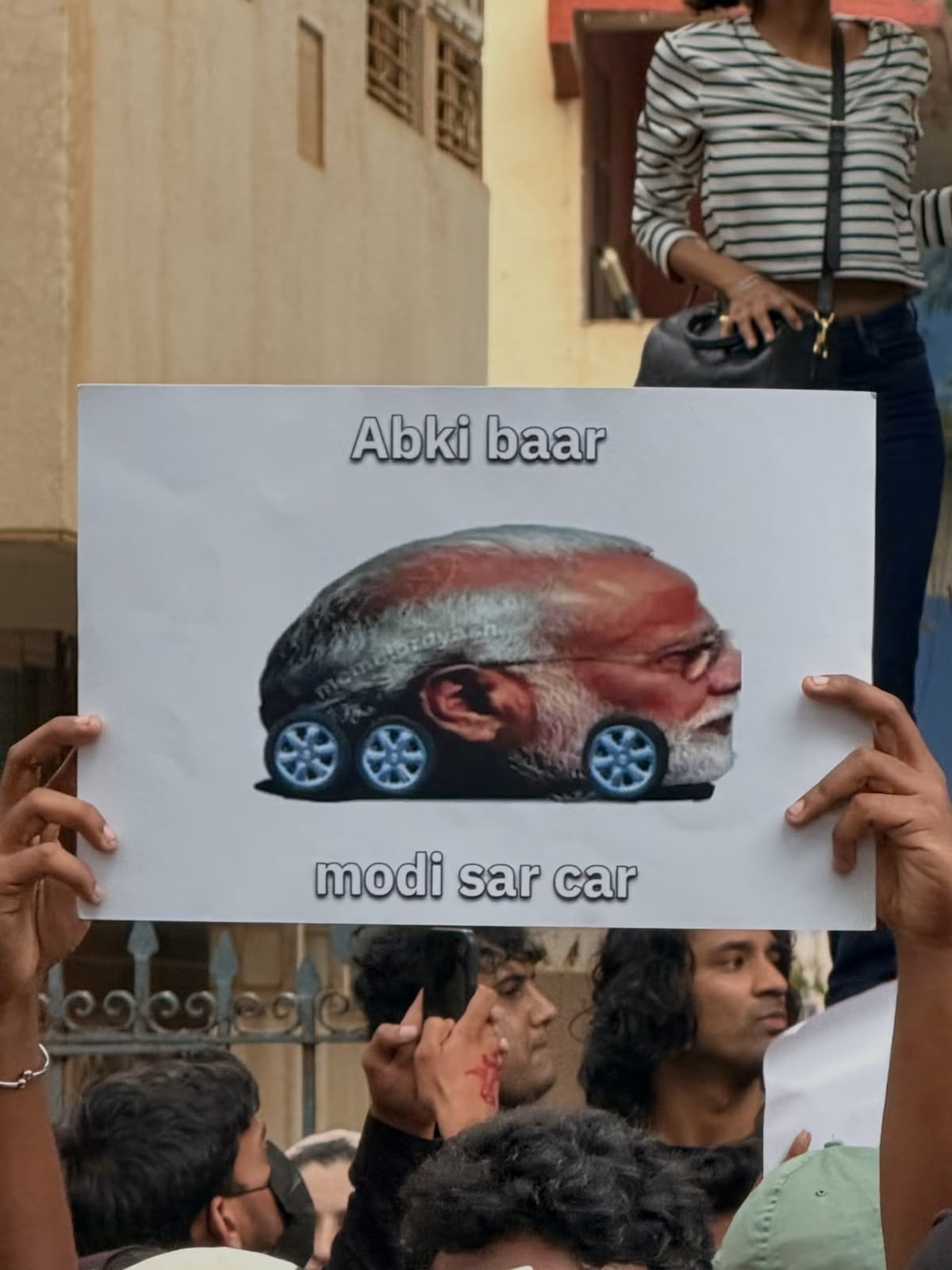 Archive photograph of a placard held at a public gathering