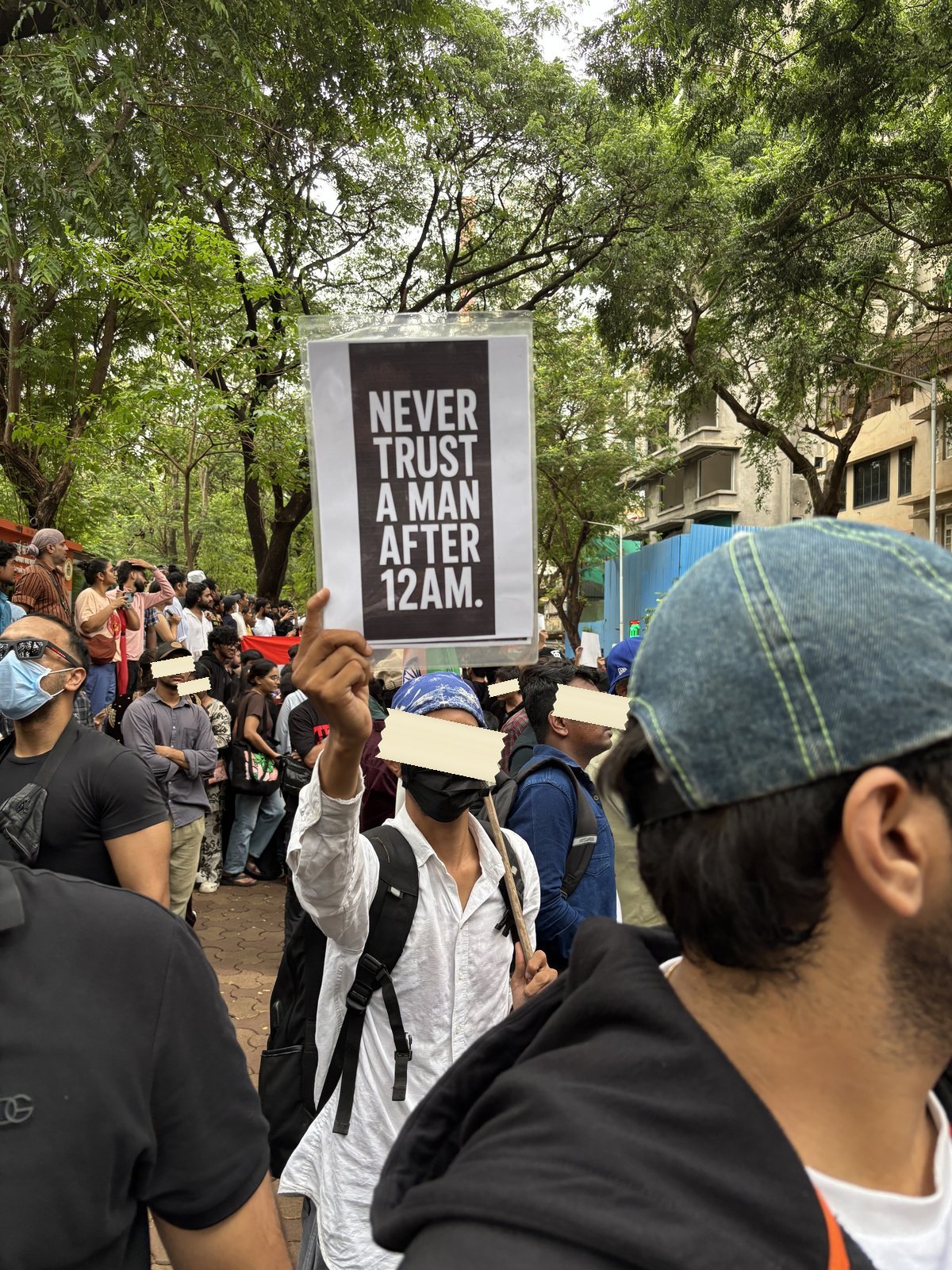 A placard above the Shivaji Park crowd in Mumbai