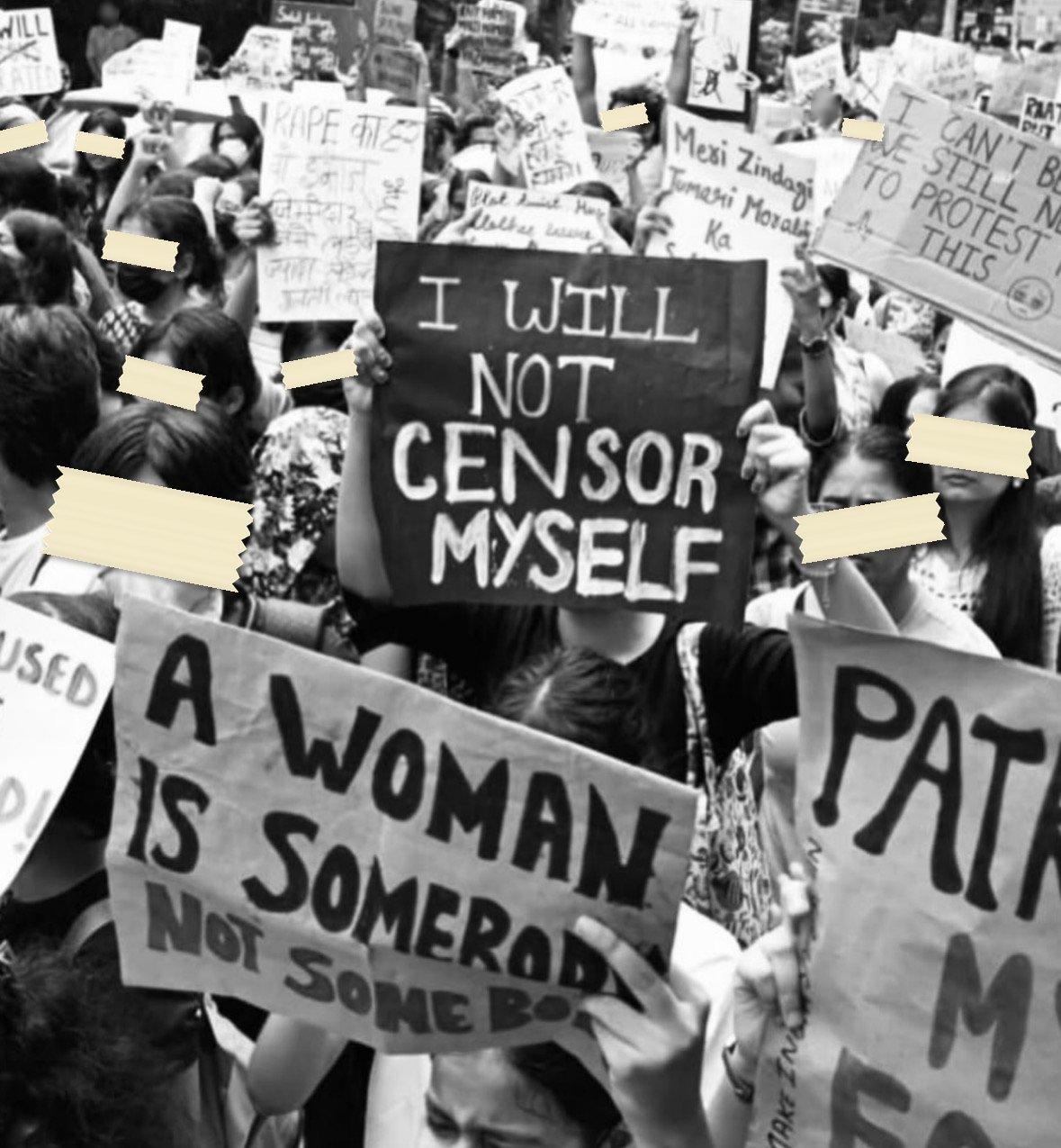 A black-and-white photograph of a dense crowd holding twenty or more hand-lettered placards, including I WILL NOT CENSOR MYSELF and A WOMAN IS SOMEBODY NOT SOMETHING.