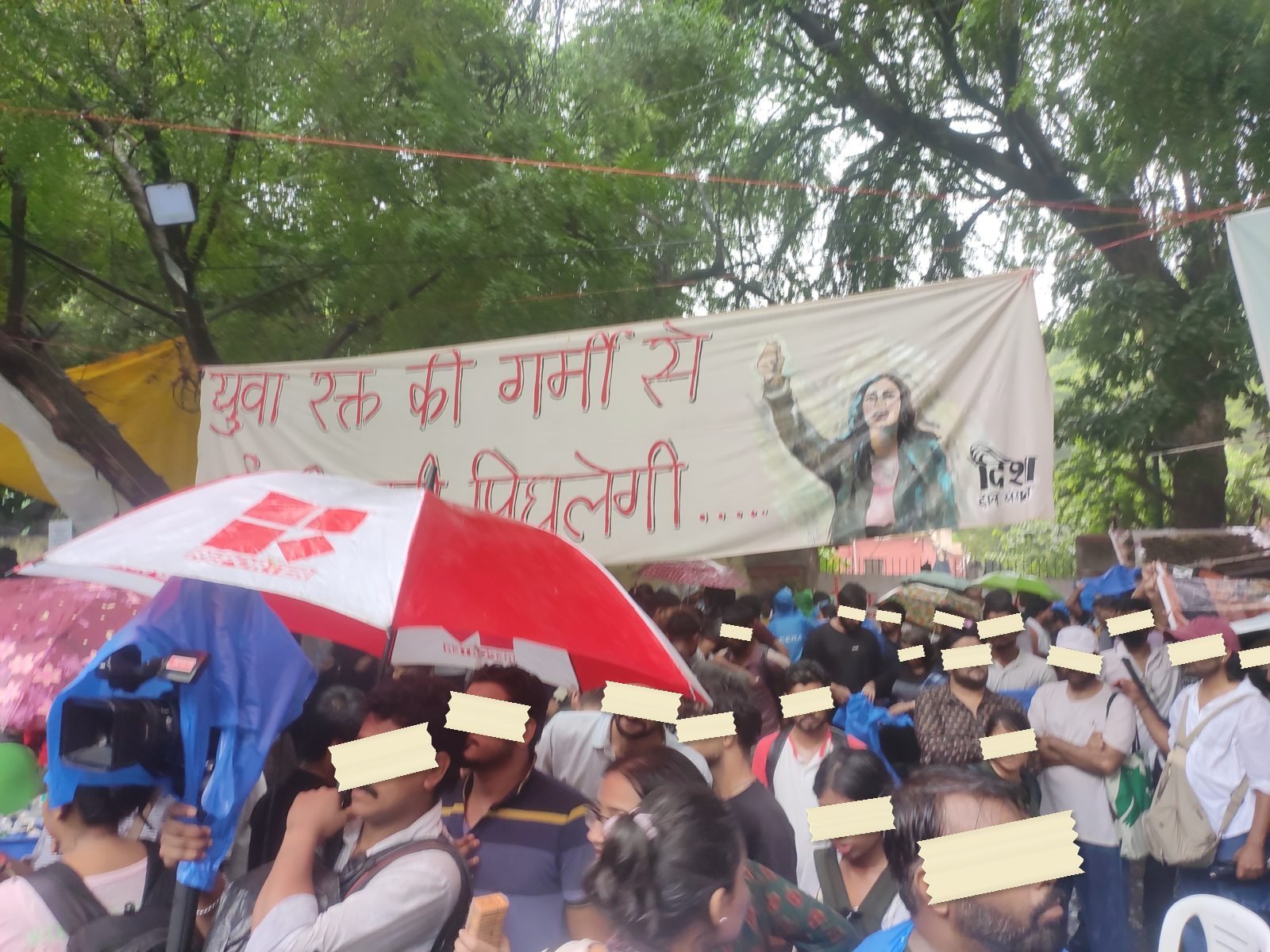 A painted banner in Hindi promises that the heat of young blood will melt the valley of ice