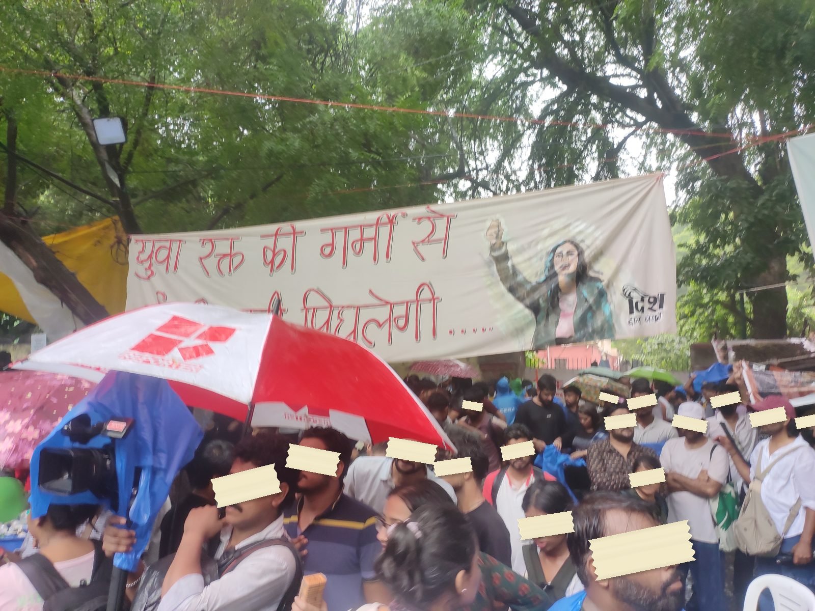 A painted banner in Hindi promises that the heat of young blood will melt the valley of ice