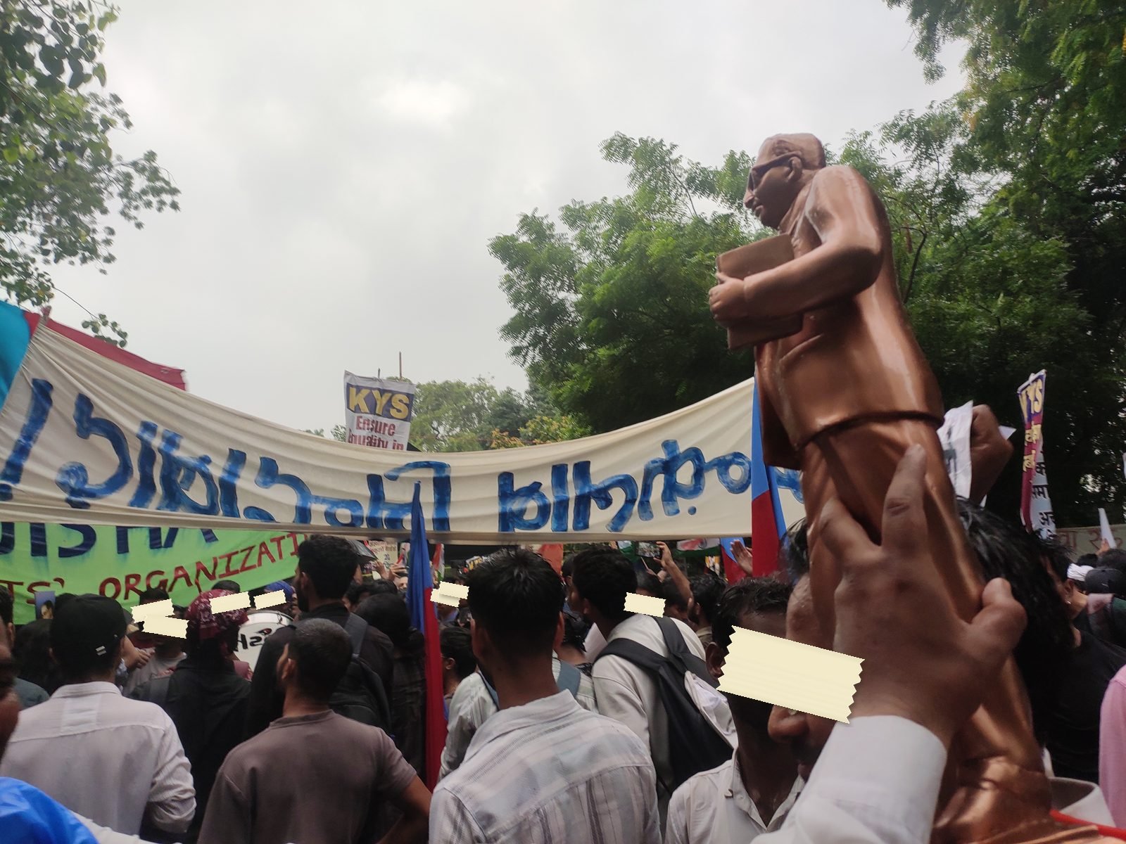 Banners beneath the statue at Jantar Mantar, Delhi